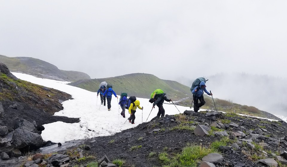 Hikers braving rough conditions on their Mt Baker Climb