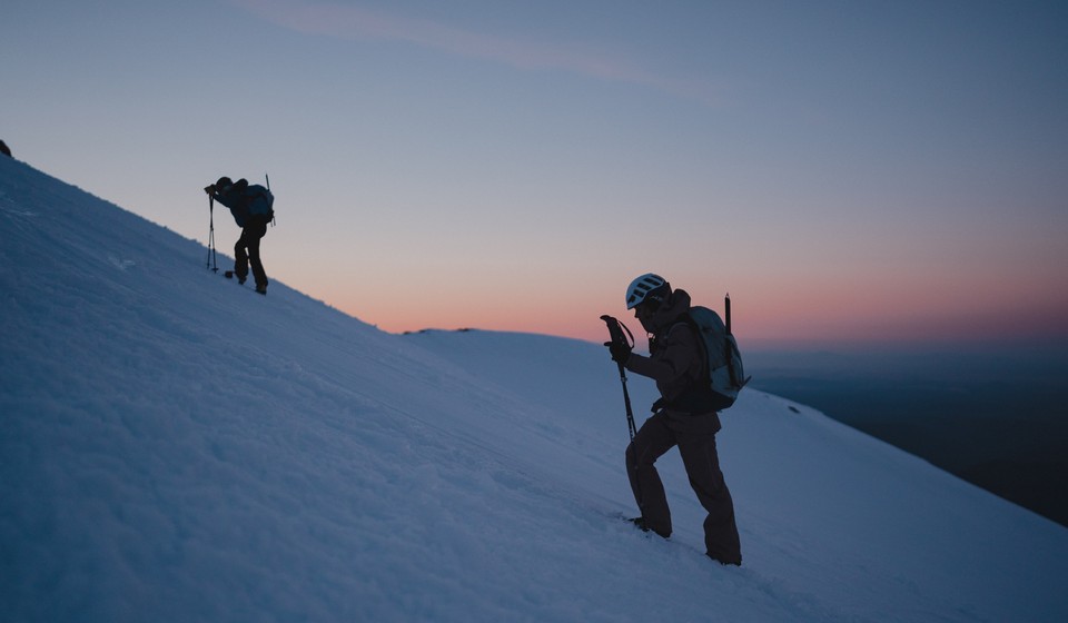 Climbers on a steep terrain