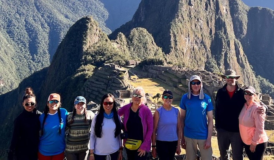 trekkers at the Macchu Picchu, one of the seven wonders of the world