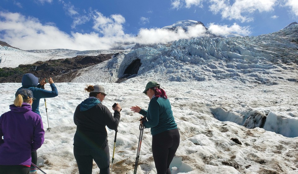 Participants exploring Glacial features on the Coleman Glacier on Mt Baker 