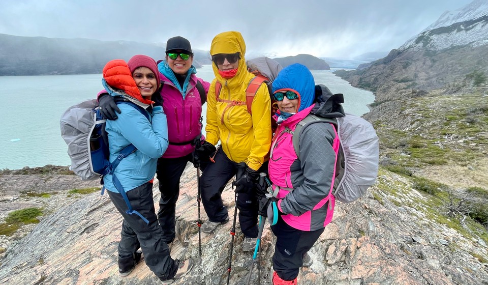 Hikers posing in front of Grey Glacier